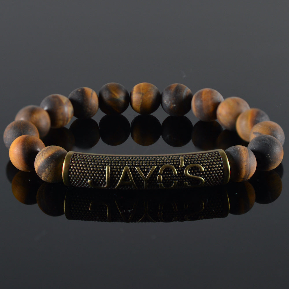   heren armband JayC's CX,  tiger-eye mat , stalen brons  bedel 