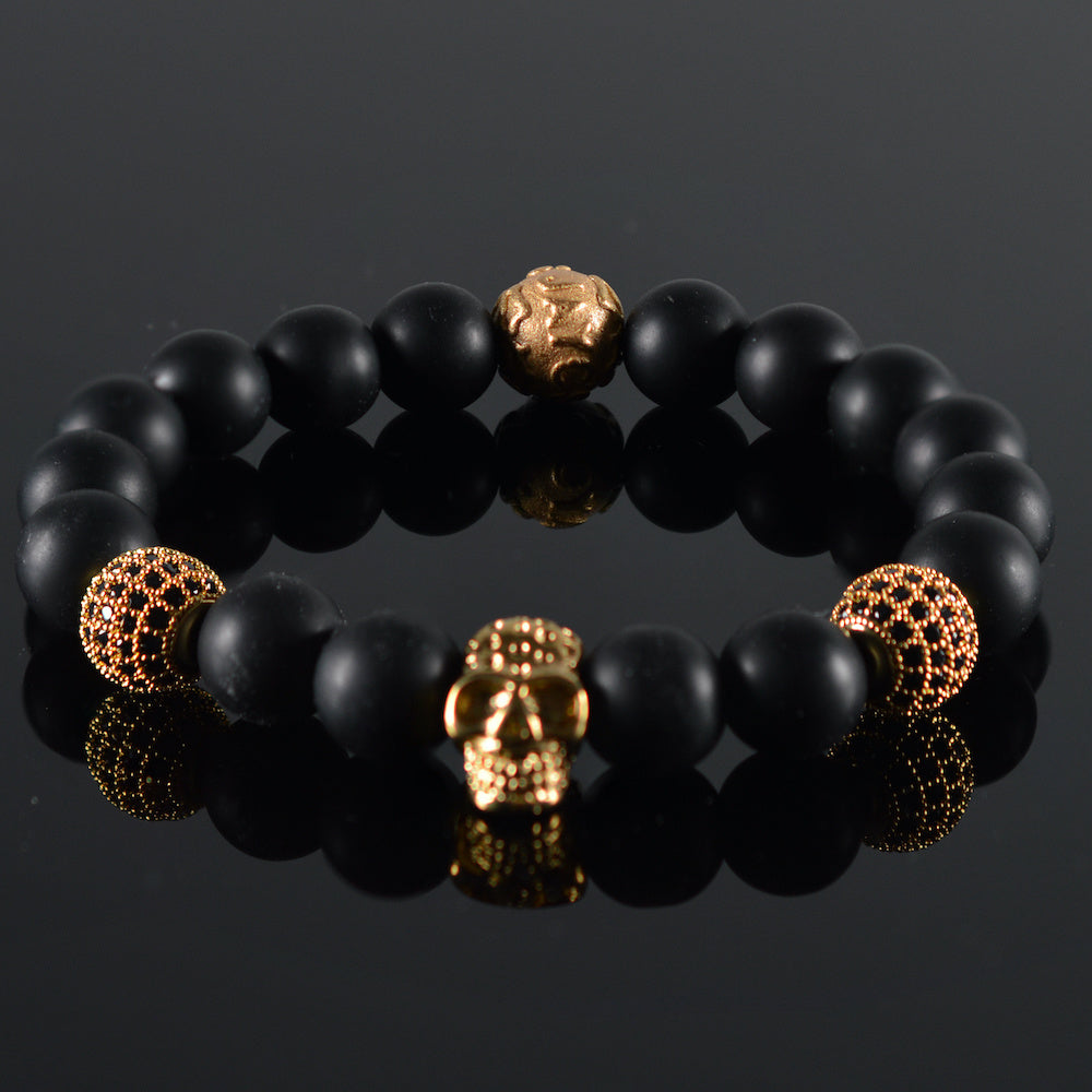 heren armband Renovo Skull Black, mat onyx zwart, goudkleur swarovski bedel, goudkleurige bedel Skull-Schedel,